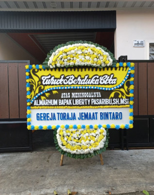 Papan Bunga Duka di Sidemen